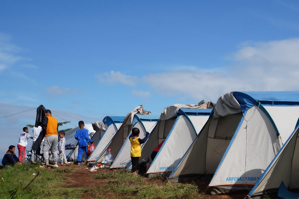 A scenic camping ground with diverse terrain in a natural setting